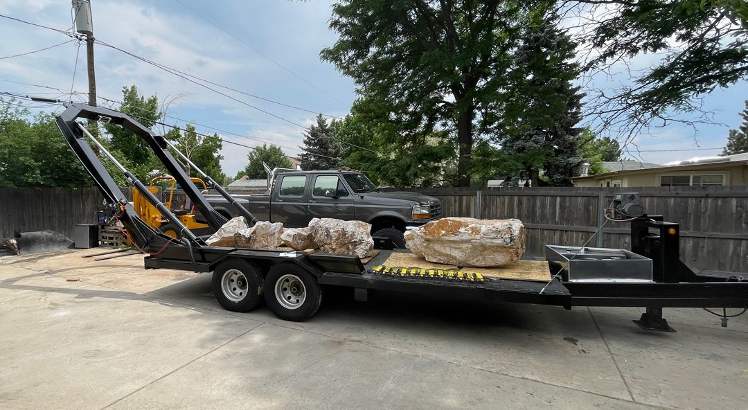 Quartz Boulders delivery truck and trailer